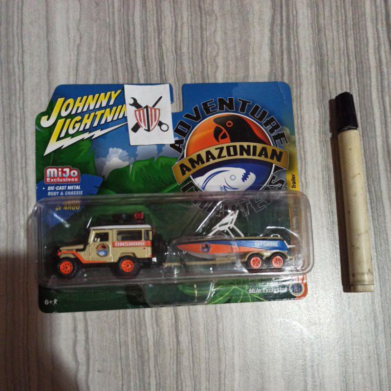 JOHNNY LIGHTNING TOYOTA LAND CRUISER TLC BOAT AMAZONIAN
