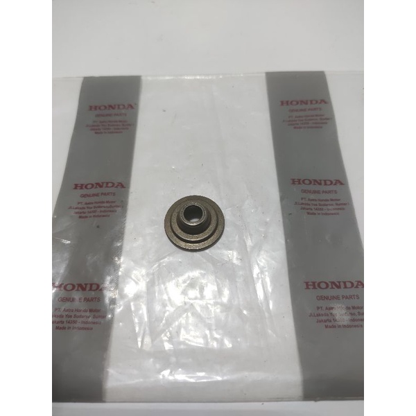 retainer  topi sim klep GENIO original