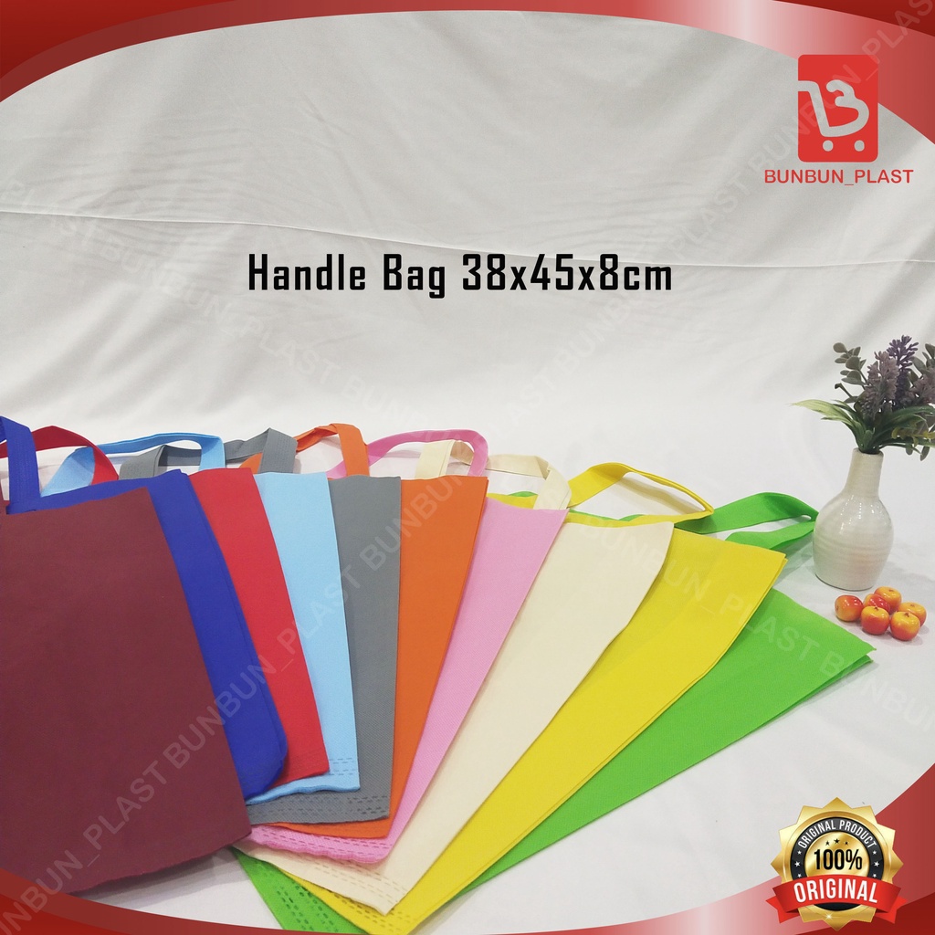 

TAS SPUNBOND HANDLE BAG 38X45X8CM PER LUSIN/12 PCS/TAS SOUVENIR