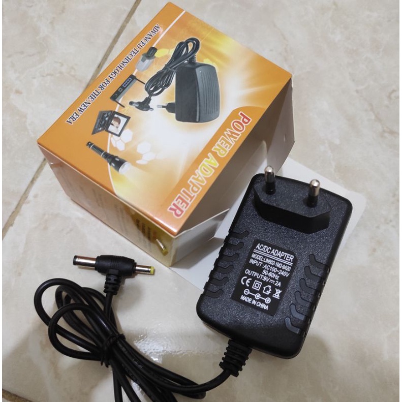 adaptor 9volt 2ampere jack T