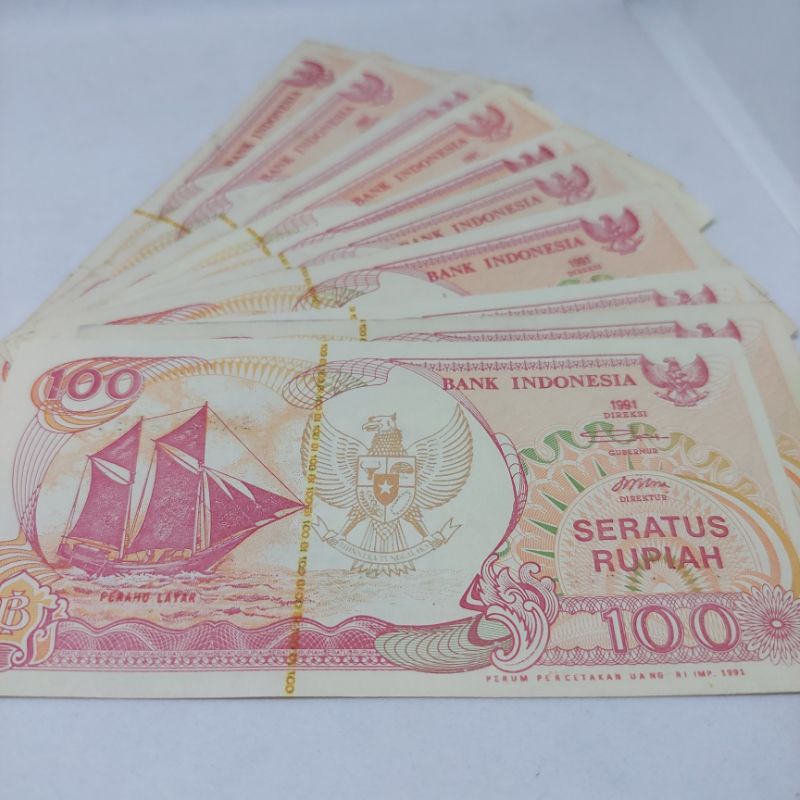 Uang Uka Uka 100 Rupiah Tahun 1991 Perahu Layar Lambang Garuda ada Benang Emas Asli
