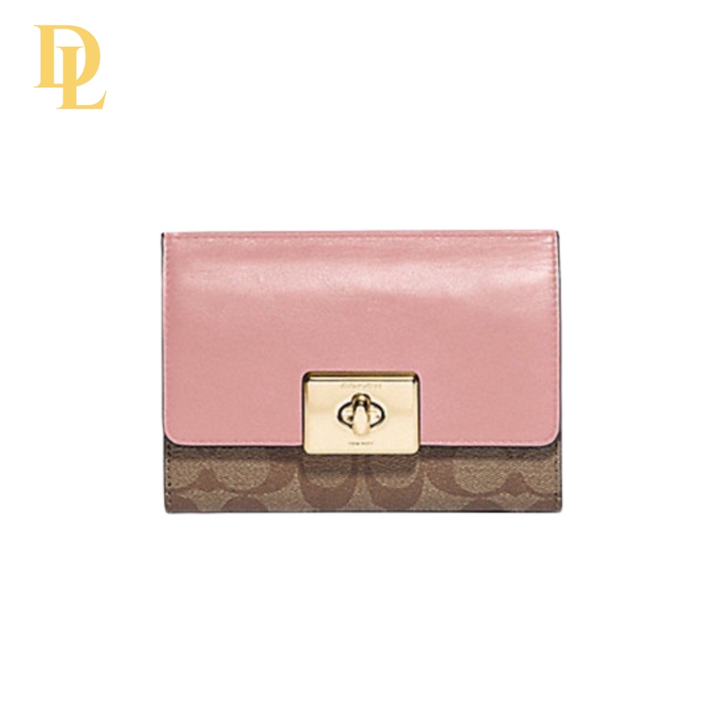 CASSIDY TURNLOCK MEDIUM WALLET IN SIGNATURE CANVAS - PINK (COACH F76789)