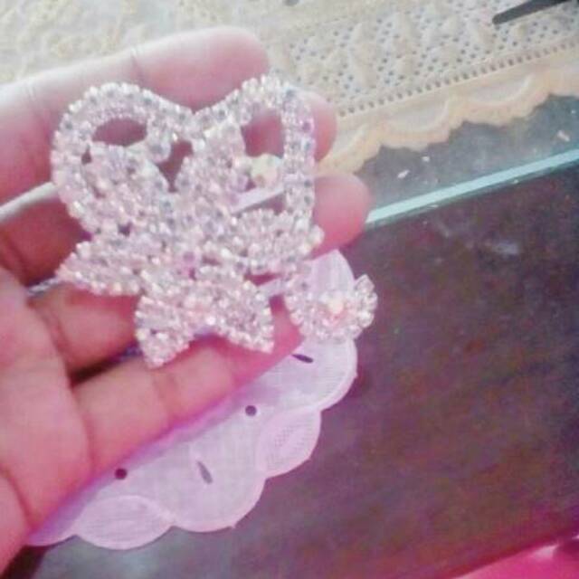 Bros permata motif bintang