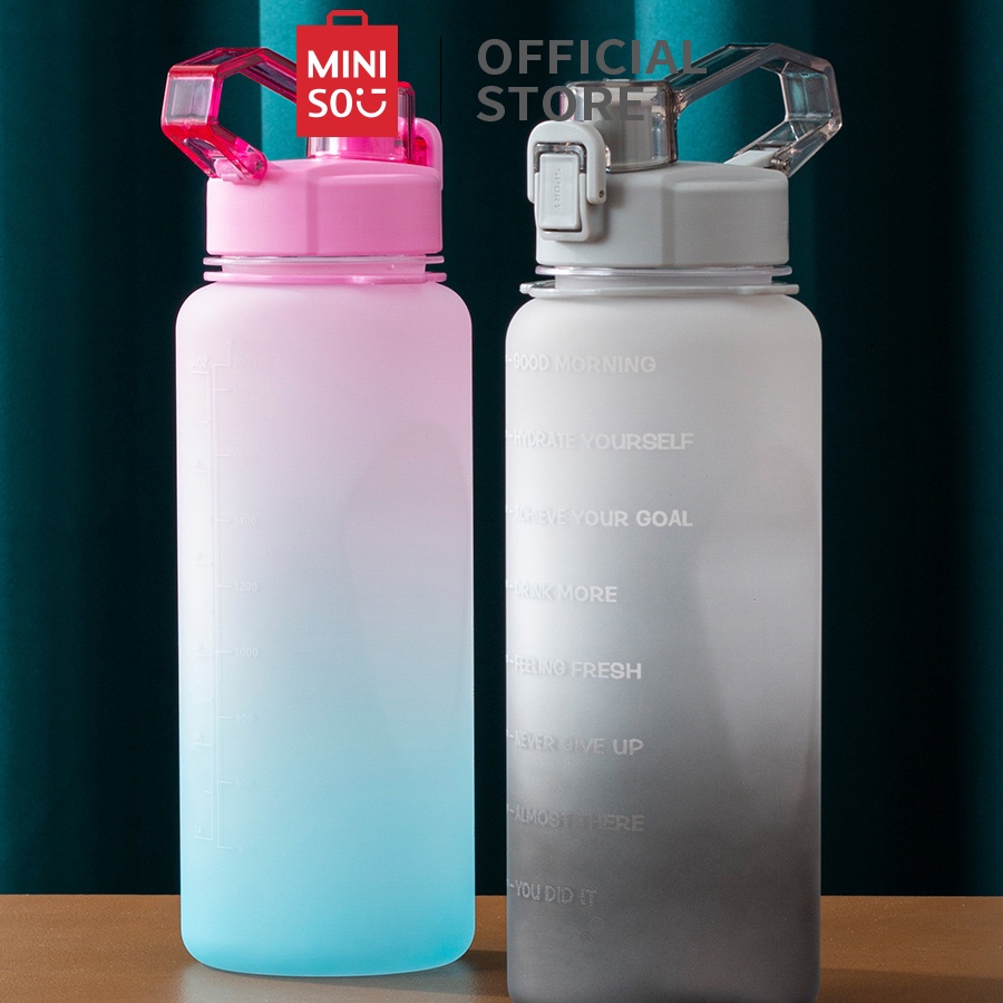 MINISO OFFICIAL Large capacity plastic cool water bottle with handle and strap for sports 2.2L / bot