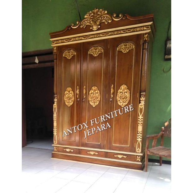 lemari pakaian jati ukiran cinta mebel Jepara
