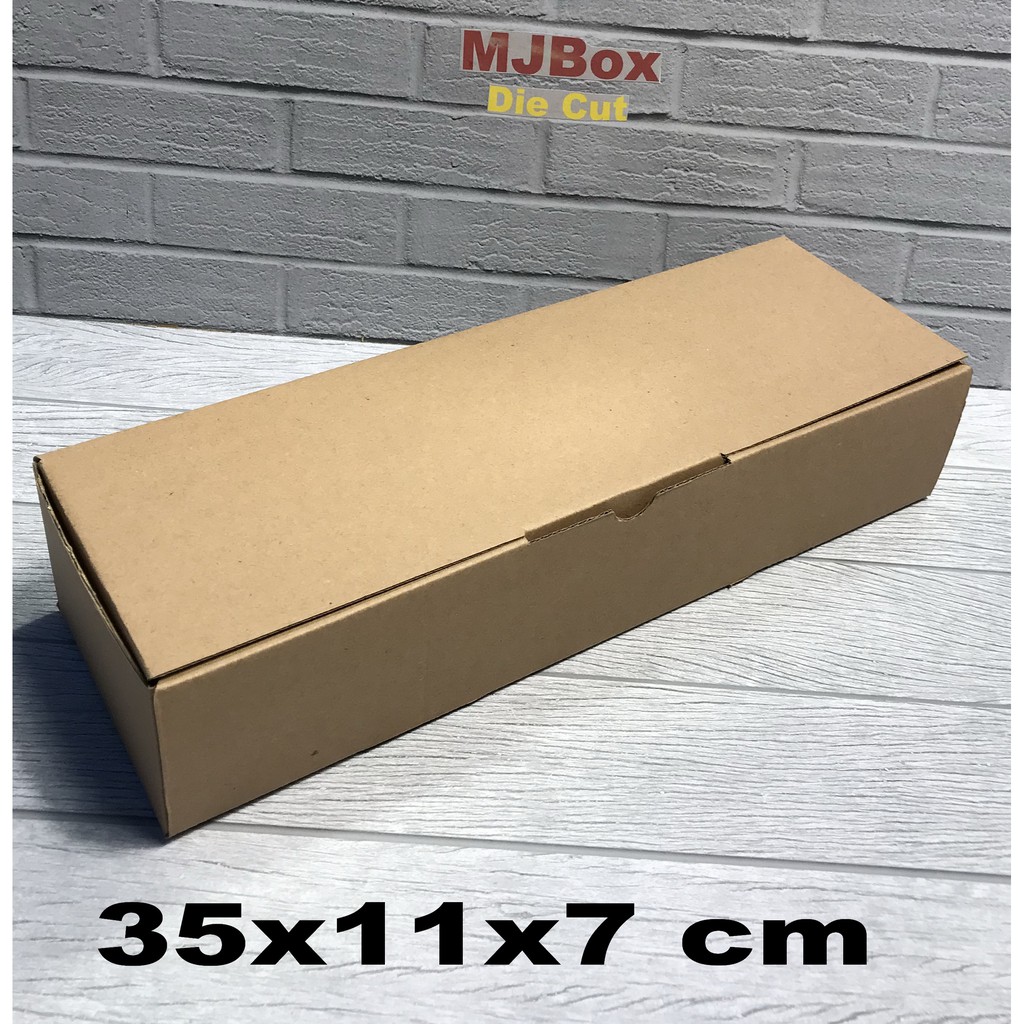 

Kardus uk. 35x11x7 cm....Die Cut karton box untuk Kotak Aksesoris dll model box pizza
