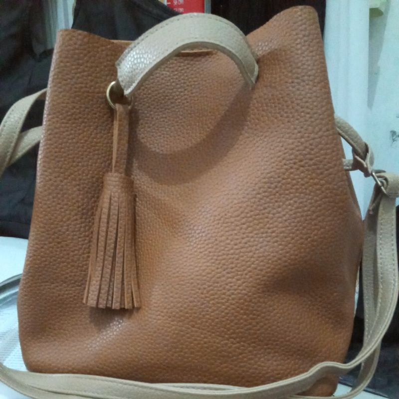 Tas serut tekstur kulit jeruk.