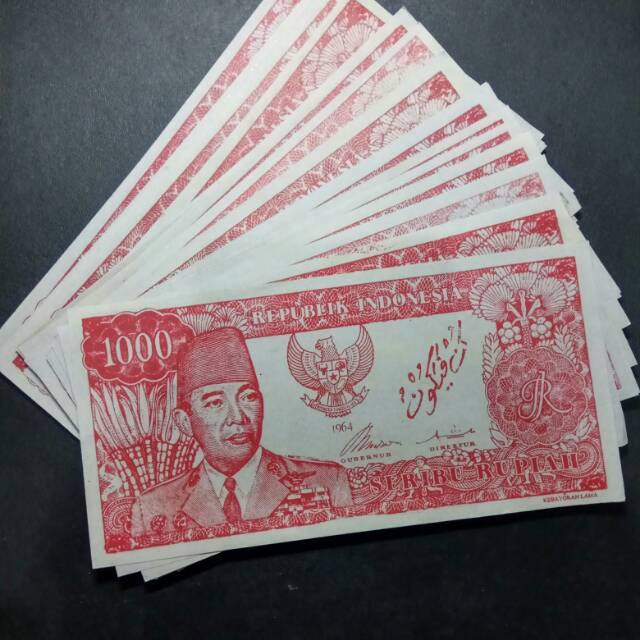 Soekarno melengkung pecahan 1000 merah