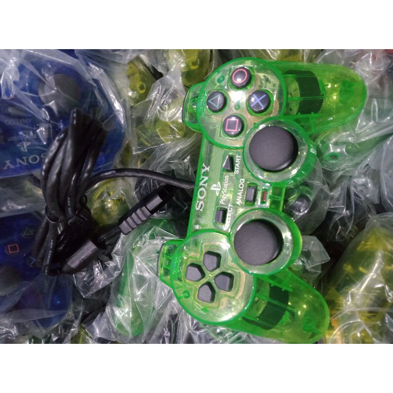 Stik ps2 op ori pabrik warna transparan kabel hitam serat
