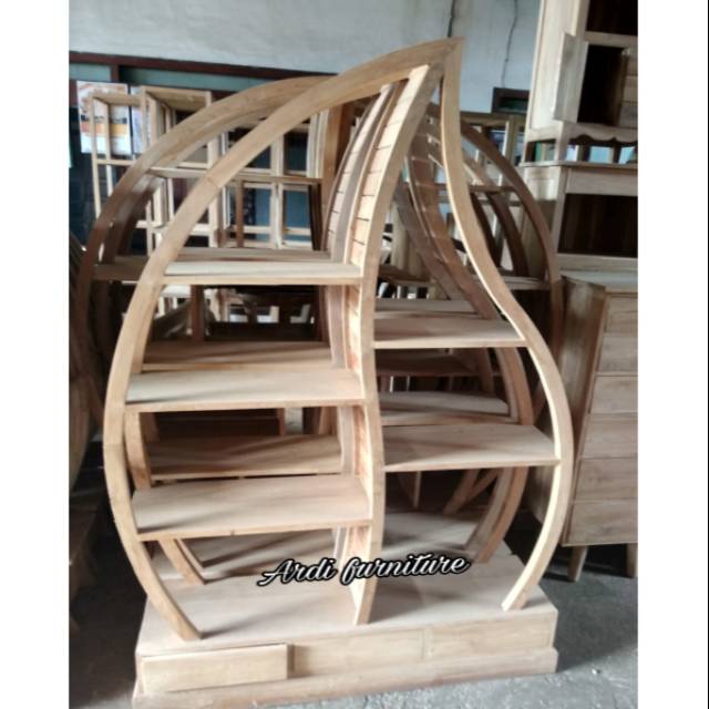 Rak buku model daun tempat pajangan minimalis jati kota ukir jepara