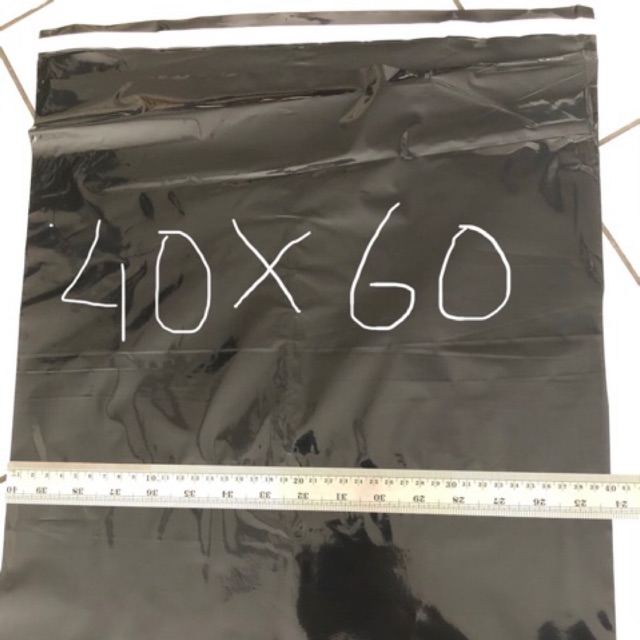 

Polymailer hitam glossy / paking uk 40x60 ( 100 pcs ) sangat tebal