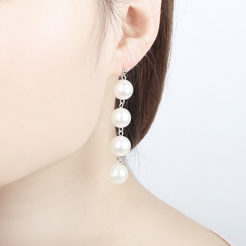 Anting mutiara besar rumbai panjang Joker anting-anting manik-manik temperamen sederhana
