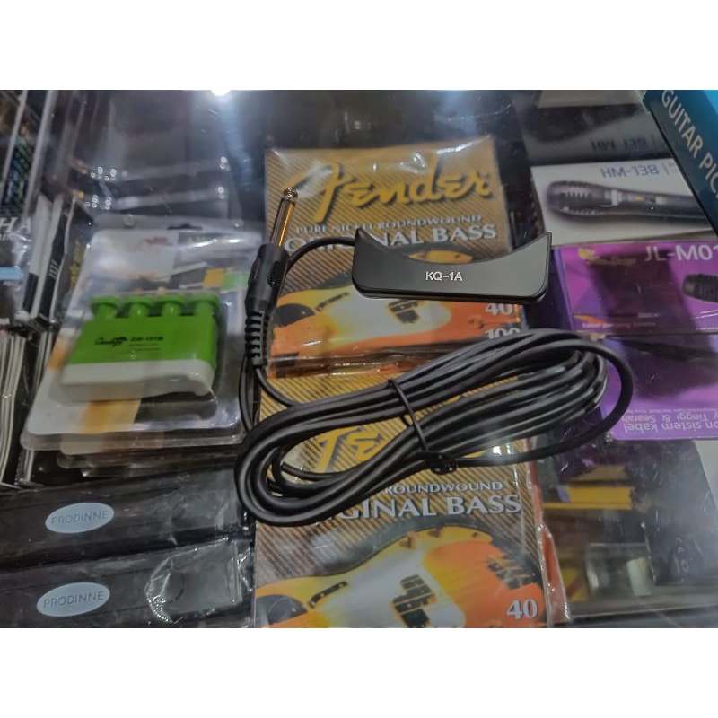 Spull gitar akustik tempel dilubang gitar