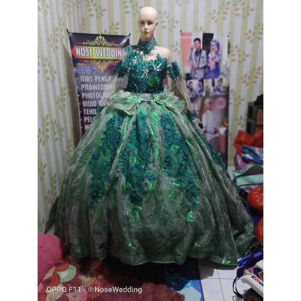 gaun pengantin hijau botol secon