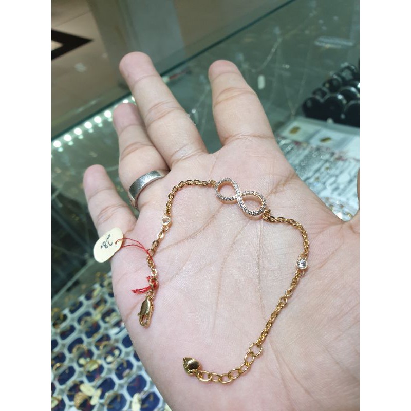 gelang emas model infinity