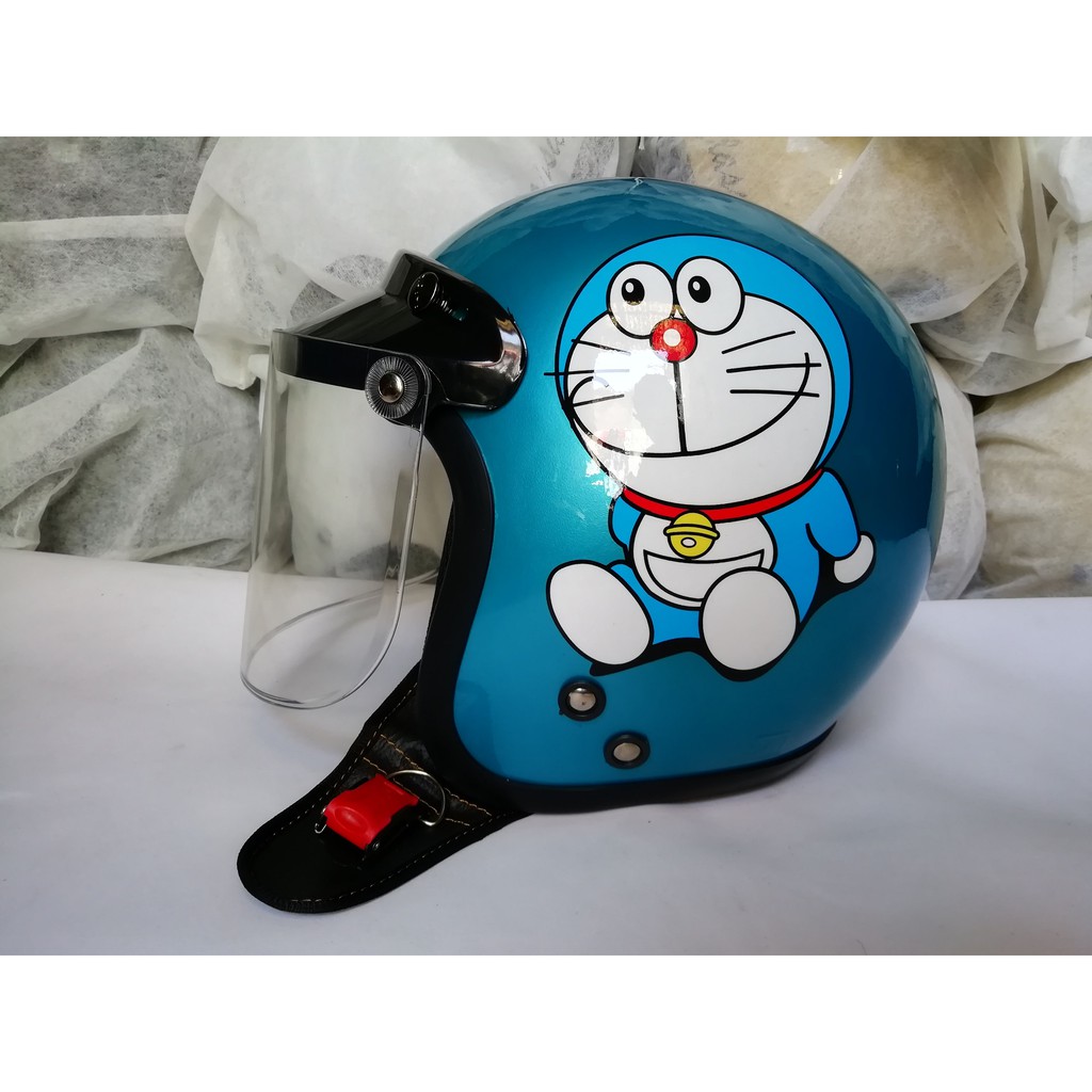 HELM DORAEMON BOGO DEWASA CAT BIRU MUDA KACA DATAR BENING