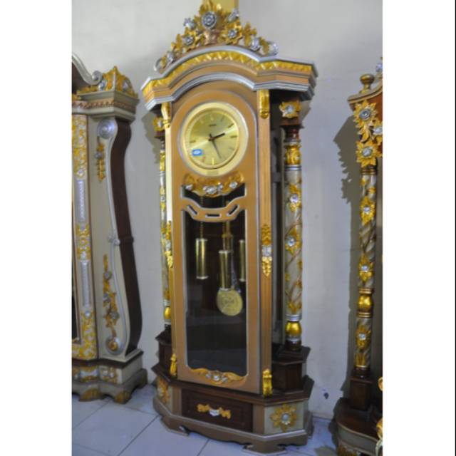 Jam Ruang Tamu Nirwana Kayu Jati