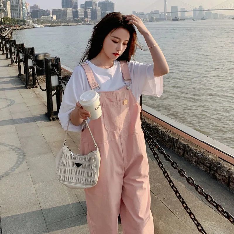 Overall denim merah muda bagian tipis musim panas wanita 2021 versi Korea baru setelan celana asing