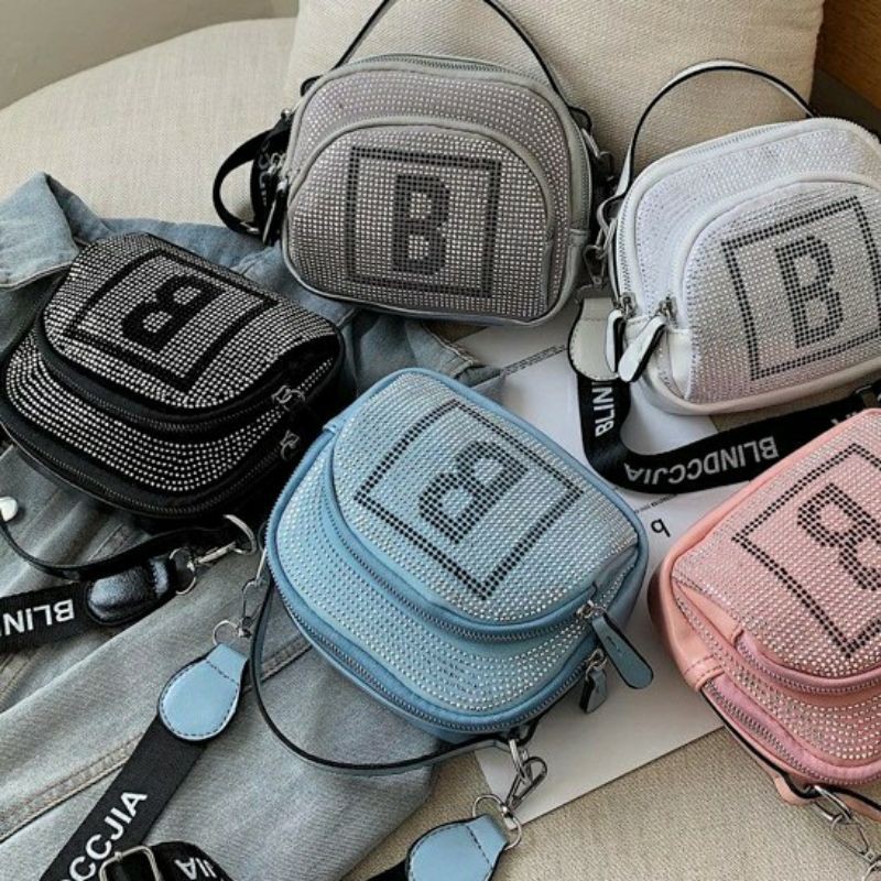 tas import bling bling