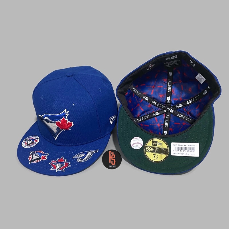 TOPI NEW ERA ORIGINAL 5950 GRAPHIC VISOR TORONTO BLUE JAYS BLUE UV GREEN