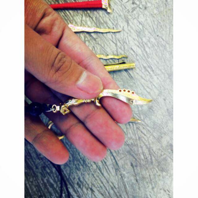 KUJANG LIOTIN KALUNG UNIK