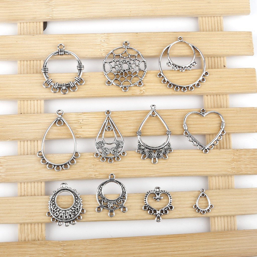 10pcs / Lot Liontin Bahan Metal Alloy Warna Silver Gaya Vintage Antik Untuk Membuat Perhiasan Anting