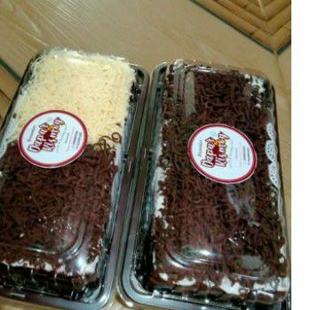 

roll cake toping serut coklat-keju