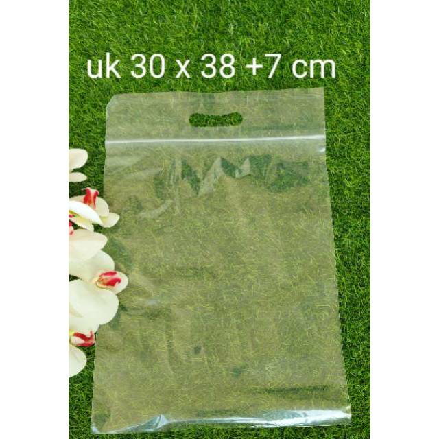 

Kantong plastik klip oval plong . klip baju distro ziplock handle handel bening 30 x 38 +7 cm