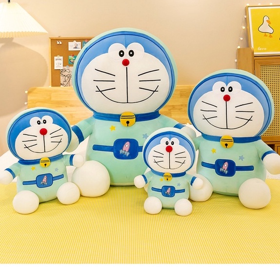 Boneka doraemon kostum tertawa bahagia bahan plush