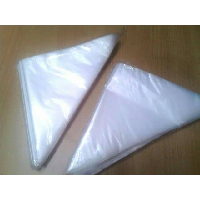 

KUE-PENGHIAS-ALAT- PLASTIK SEGITIGA/PIPING BAG - 20 LEMBAR -ALAT-PENGHIAS-KUE.