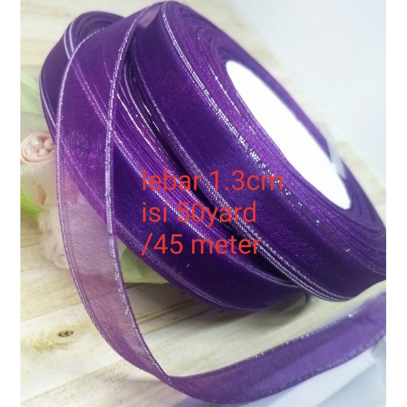 

per rol 50yard/45 meter,pita organdi ungu list silver/metalik.lebar 1.3cm