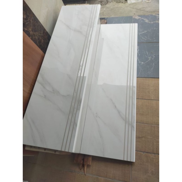 granit tangga 30x100 25x100