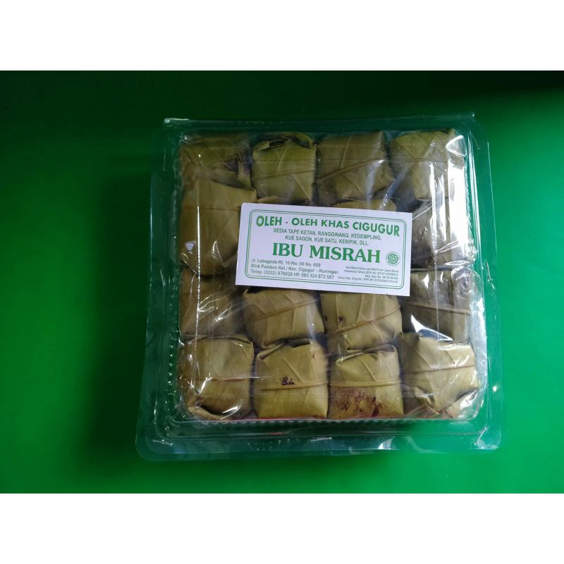 

Ibu Misrah Tape Ketan Bulat Hijau Asli Cigugur Bungkus Daun Jambu Kemasan Mika Plastik Isi 40