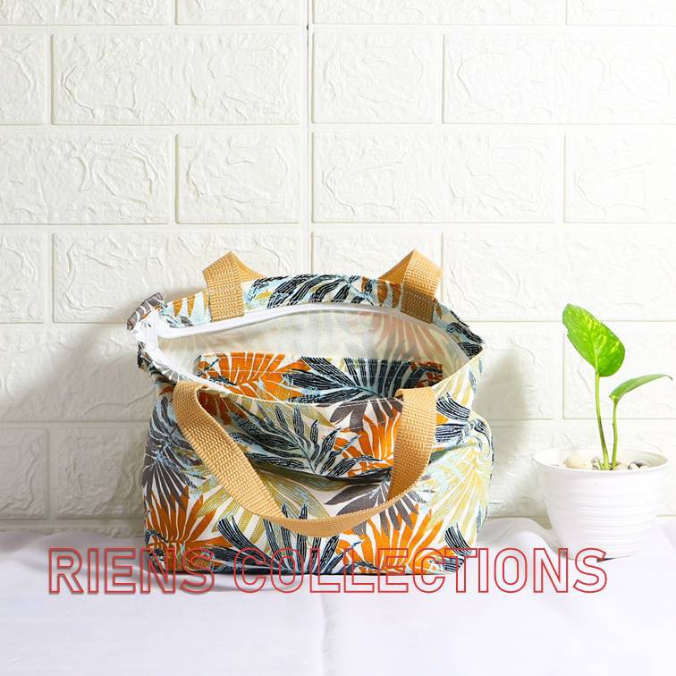 RIENS COLLECTIONS. HANDBAG KECIL BAHAN KANVAS MOTIF FLORAL PALM ORANGE