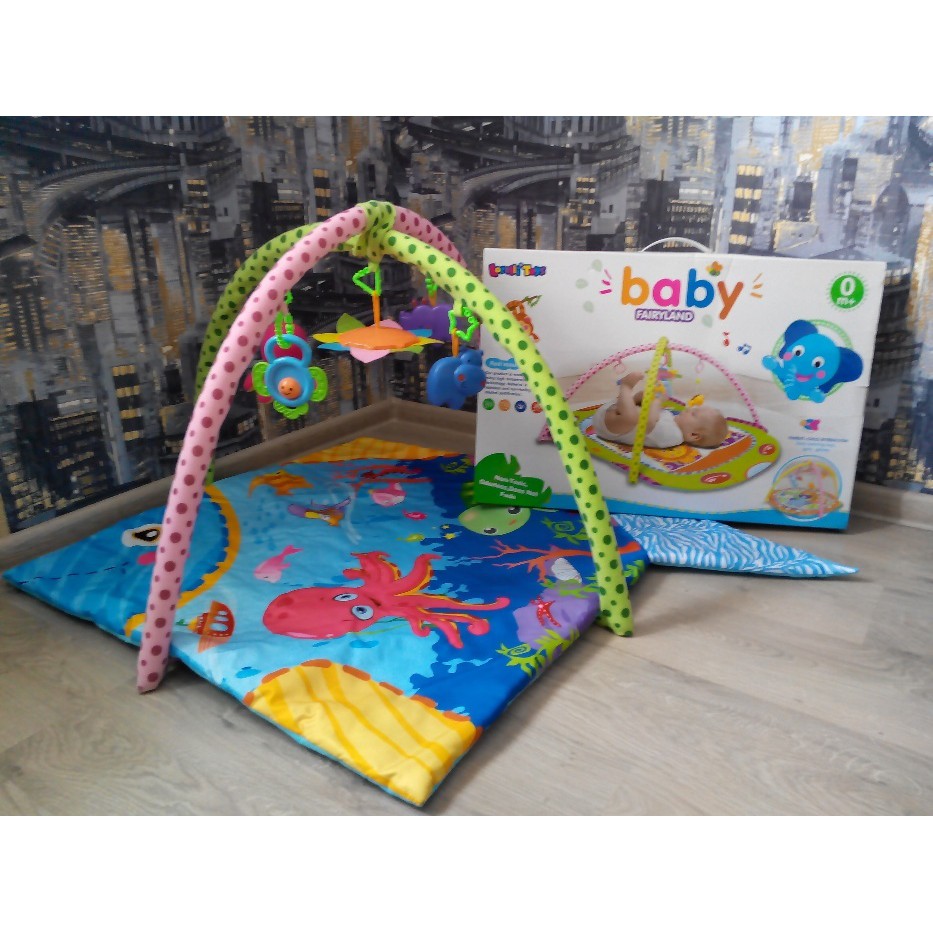 Baby Fairyland Playmat seperti yang terpasang model octopus. bukan yg box/dus