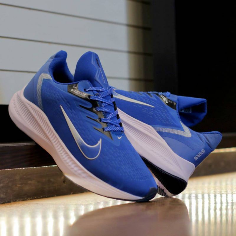 nike zoom gravity white racer blue