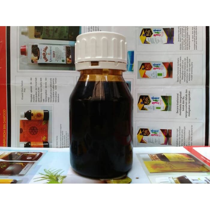 

madu hitam pahit murni 350 gr