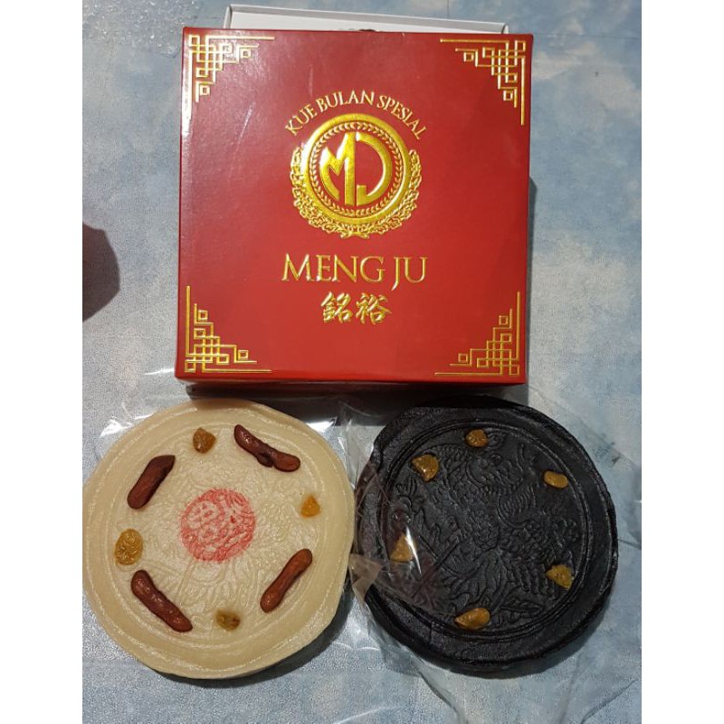 

(1 Kotak = 2 Pcs) MENGJU - MENG JU - Ama Ko - Lau Ma Ko - Nyon Nyion Kau - Mochi Pontianak ukuran Besar Non Halal