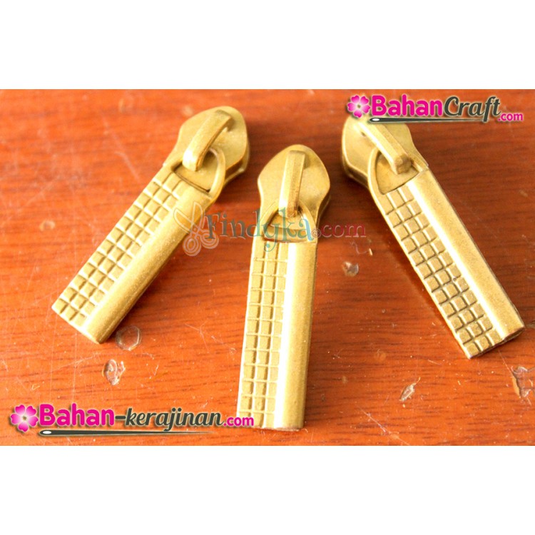 Kepala resleting utk rits plastik KRP07 gold harga per pc(biji)
