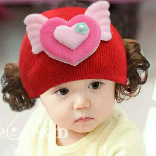 Topi kupluk rambut palsu