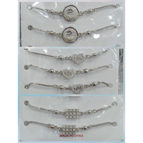 C-9300.Gelang serut silver xuping wanita berlapis emas dengan mata zircon.