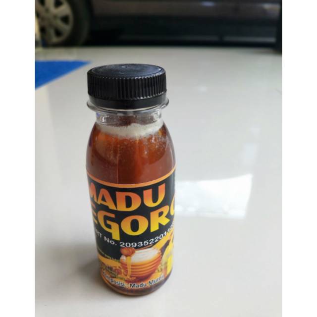 

madu jonegoro 100 ml warna gelap