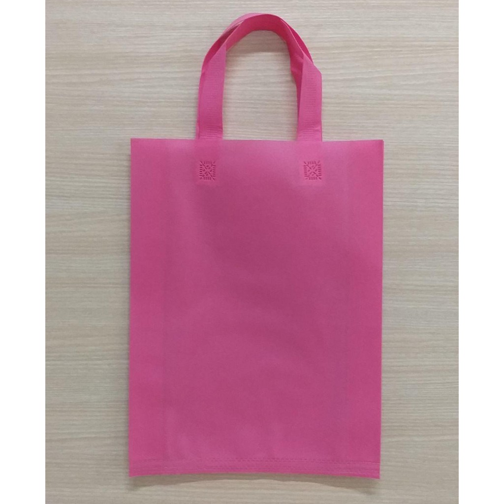 

GOODIE BAG 30X40 / SPUNBOND HANDLE MURAH / Tas Belanja MURAH / Tas Souvenir (Warna Pink)