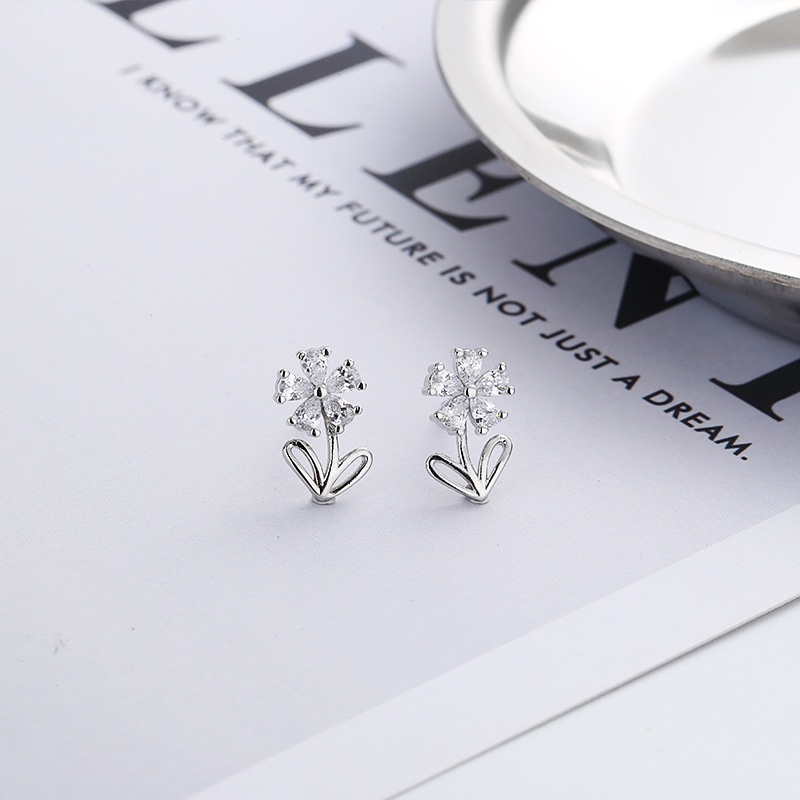 Anting Tusuk Bentuk Daun Hollow Aksen Batu Zircon Untuk Wanita