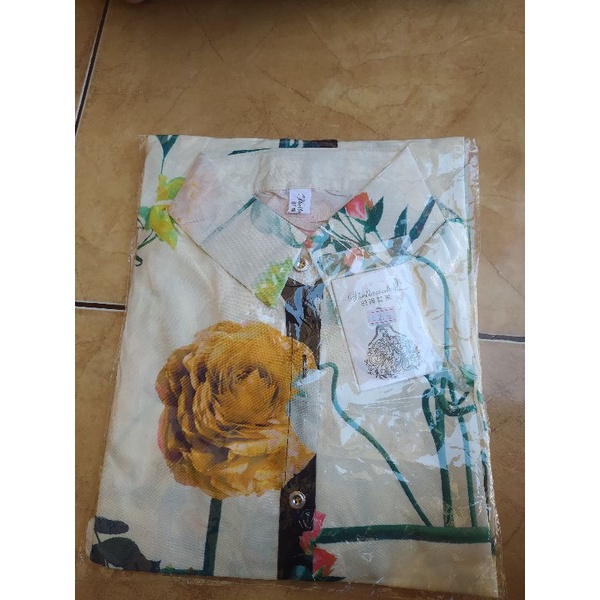kemeja motif shellasaukia