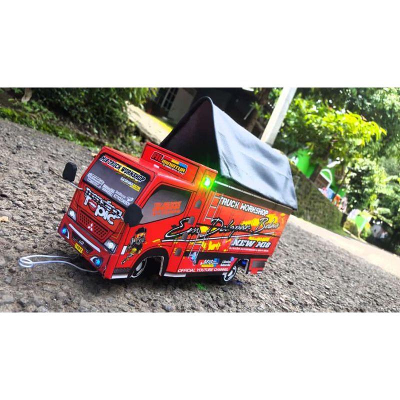 miniatur truk oleng lampu terpal
