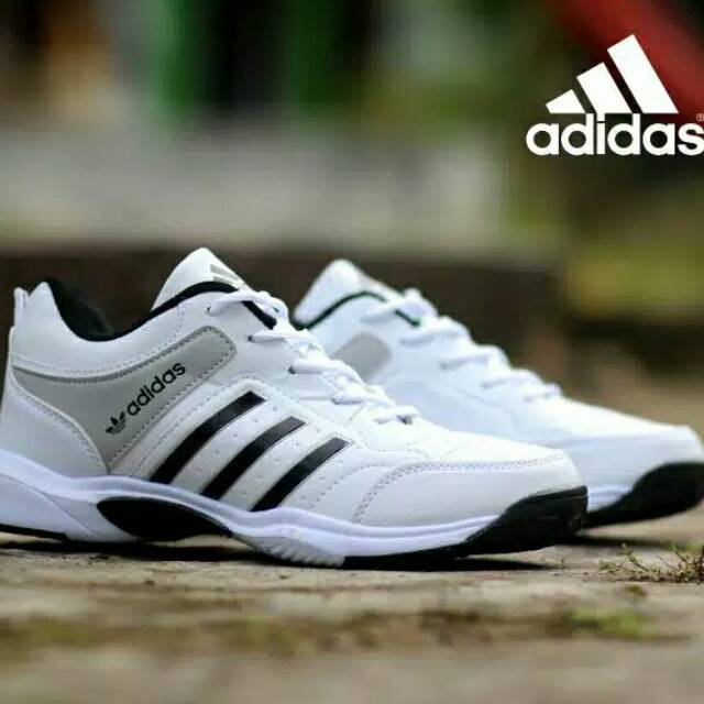 black and white adidas tennis shoes