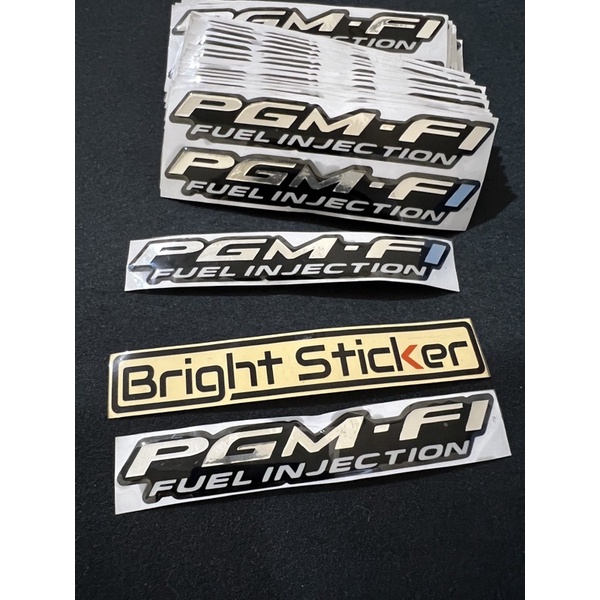 STICKER EMBLEM PGM FI FUEL INJECTION TIMBUL