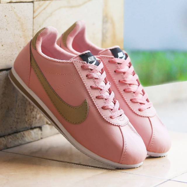 peach nike cortez