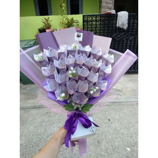 

bouqate/bucket uang asli